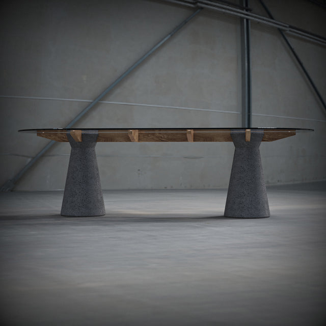 Dining table made of Lava Stone, solid wood and smoked glass